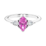 Three stone marquise diamond ring with dramatic center shape.