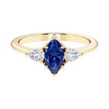 Marquise cut 3 stone engagement ring with elegant taper.