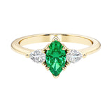 Marquise cut 3 stone engagement ring with elegant taper.