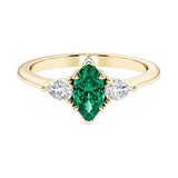 Marquise cut 3 stone engagement ring with elegant taper.