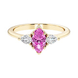 Marquise cut 3 stone engagement ring with elegant taper.