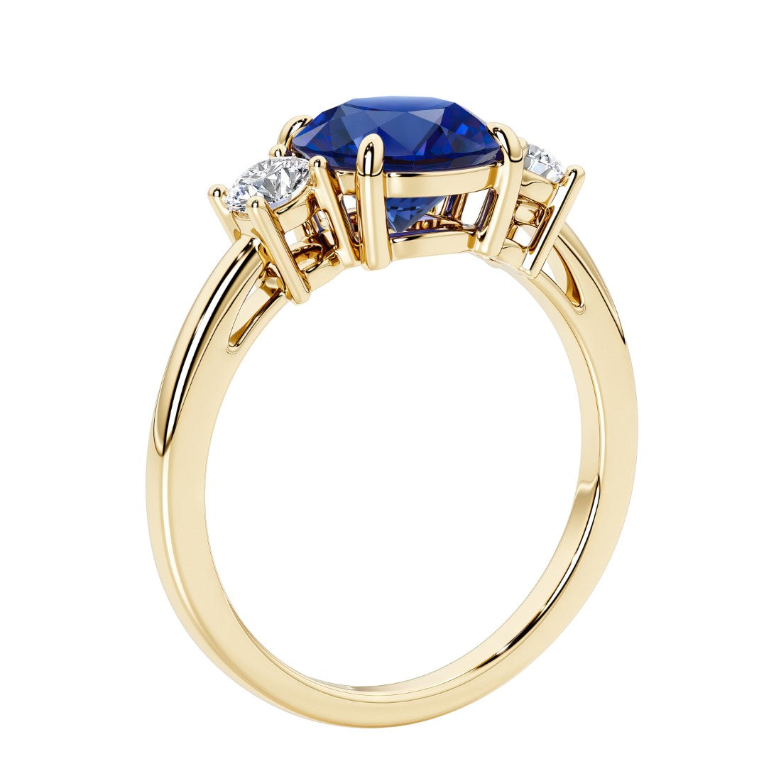 3 stone round diamond ring in classic yellow gold setting.