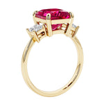 Elegant three stone princess cut engagement ring with ruby and diamonds.