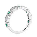 Half eternity gemstone and diamond ring with 9 marquise stones—perfect for a wedding anniversary.