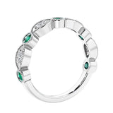 Half eternity gemstone and diamond ring with 9 marquise stones—perfect for a wedding anniversary.