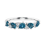 Elegant anniversary ring with 9 alternating pear shaped Alexandrite and brilliant round diamonds.