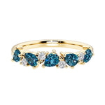 9-stone gemstone anniversary band featuring pear-cut Alexandrite and round diamonds for a magical, color-shifting effect.