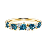 9-stone gemstone anniversary band featuring pear-cut Alexandrite and round diamonds for a magical, color-shifting effect.