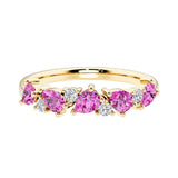 9-stone gemstone anniversary band featuring pear-cut pink sapphires and round diamonds for a magical, color-shifting effect.
