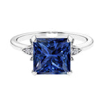 Nature inspired ringprincess cut blue sapphires and brilliant round diamonds.