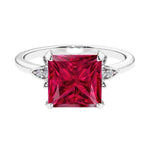 Nature inspired ringprincess cut ruby and brilliant round diamonds.