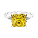 Nature inspired ringprincess cut yellow sapphires and brilliant round diamonds.