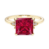 Nature inspired ring featuring princess cut ruby and round diamonds for a magical, color-shifting effect.