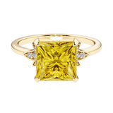 Nature inspired ring featuring princess cut yellow sapphires and round diamonds for a magical, color-shifting effect.