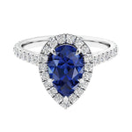 Halo ring with diamond french pave band.