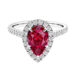 Halo ring with diamond french pave band.