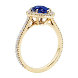 Beautiful Blue Sapphire french pave diamond engagement ring with classic styling.