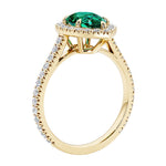 Beautiful Emerald french pave diamond engagement ring with classic styling.
