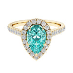 Pear shaped paraiba tourmaline and french pave diamond ring.