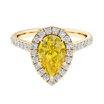 Pear shaped yellow sapphire and french pave diamond ring.