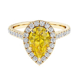 Pear shaped yellow sapphire and french pave diamond ring.