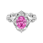 Antique oval pink sapphire and diamod ring white gold