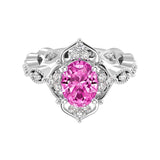Antique oval pink sapphire and diamod ring white gold