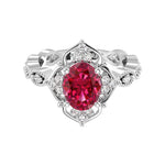Antique oval ruby and diamod ring white gold
