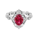 Antique oval ruby and diamod ring white gold