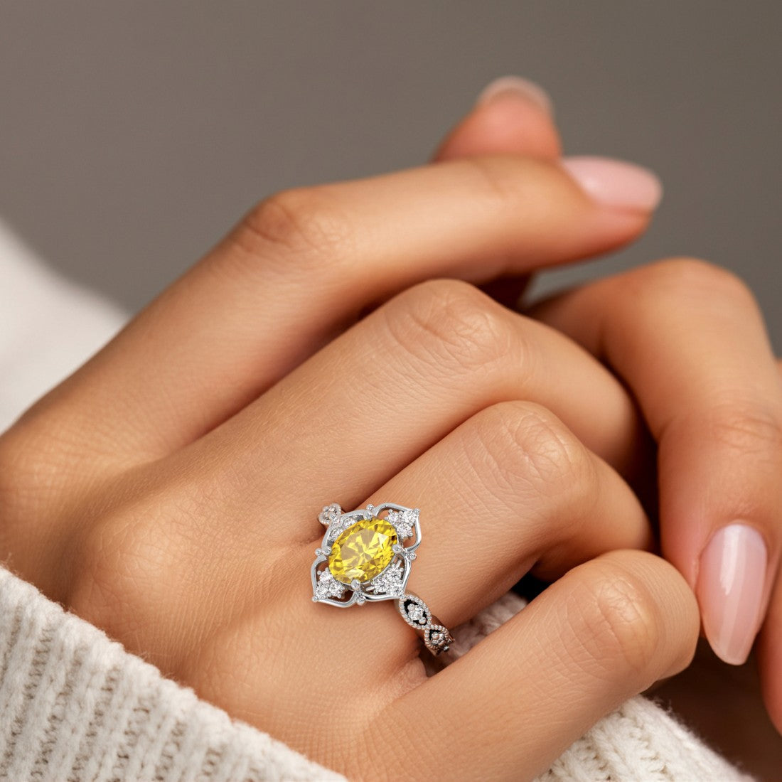 Oval gemstone with diamond cluster in vintage inspired ring setting, milgrain eternity band.