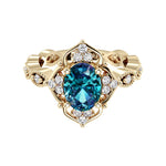 Oval cut vintage Alexandrite and diamond ring in yellow gold