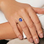 Pel & Co. The Taj sapphire engagement ring, cushion blue sapphire set in bezel solitaire with arched gallery detail