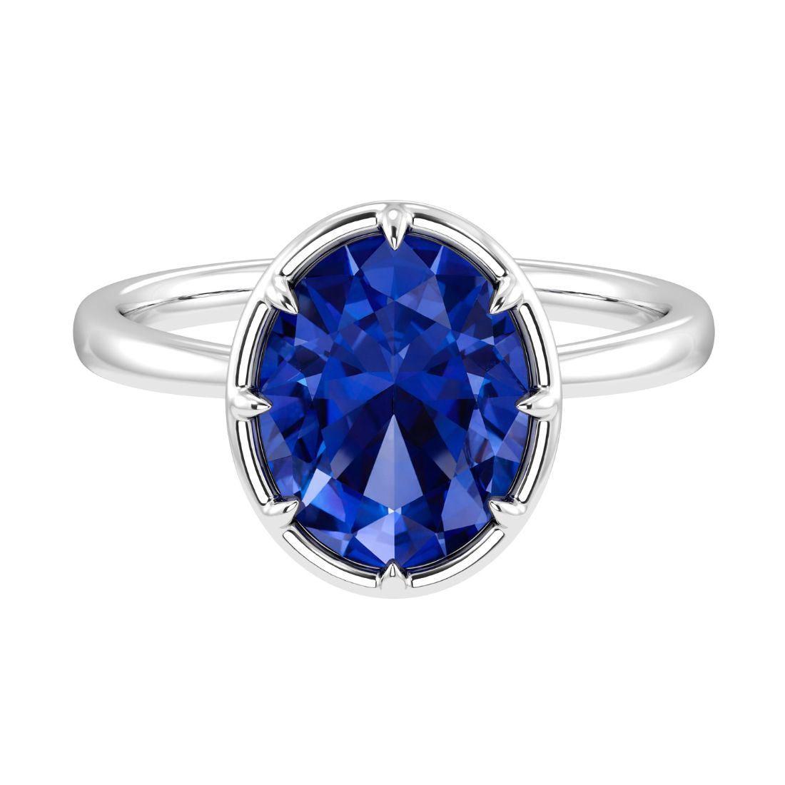Blue sapphire oval solitaire bezel ring in 14K white gold with tapered band by Pel & Co – deep royal blue natural sapphire engagement ring