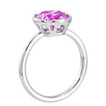Timeless oval pink sapphire bezel set ring with tapered white gold band – Pel & Co pink sapphire engagement ring
