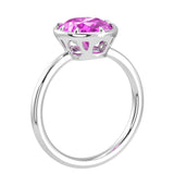 Timeless oval pink sapphire bezel set ring with tapered white gold band – Pel & Co pink sapphire engagement ring