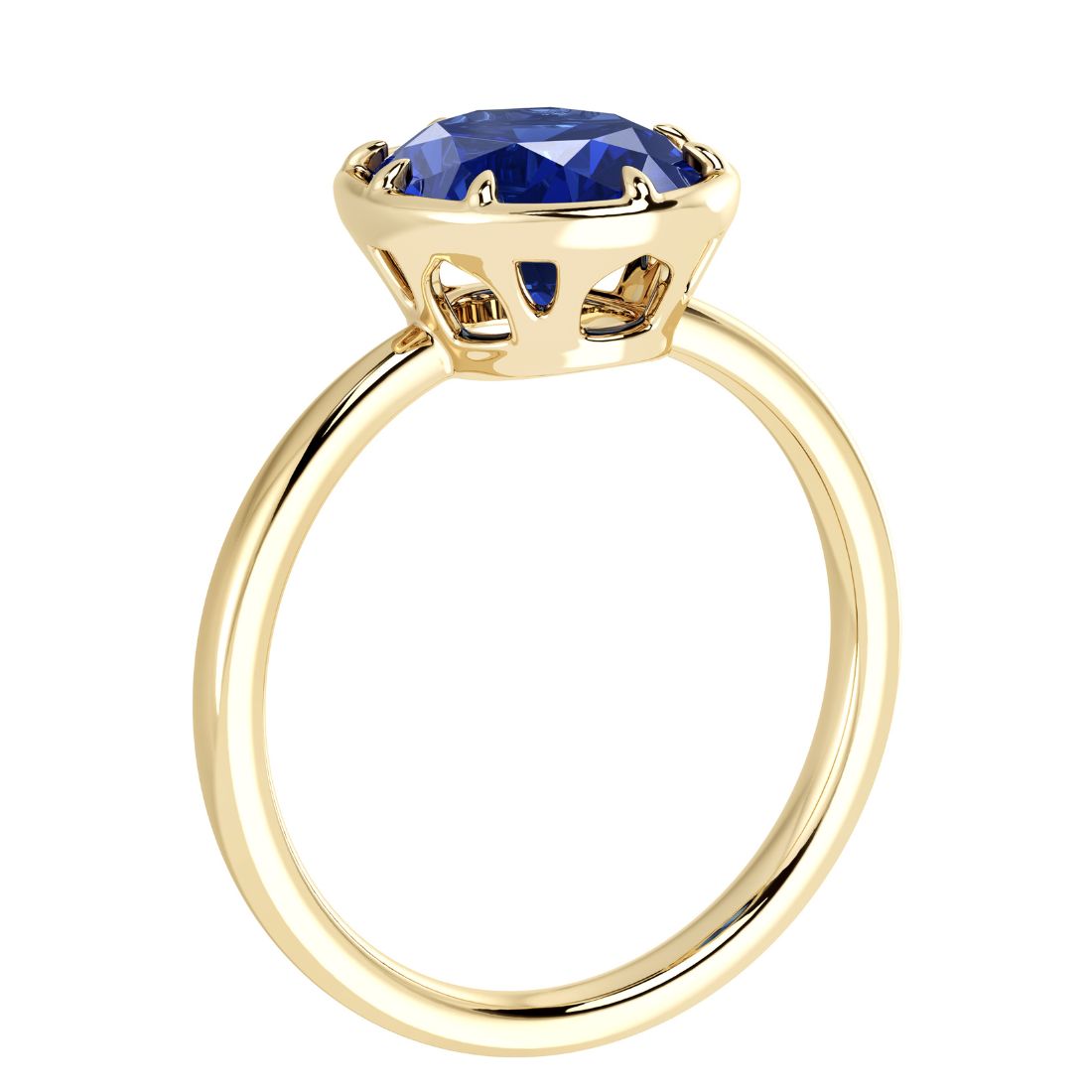 Deep blue oval sapphire solitaire bezel ring with tapered yelllow gold band by Pel & Co – elegant sapphire engagement ring