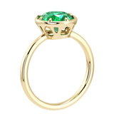 Classic oval Colombian emerald solitaire ring in yellow gold bezel setting with tapered band – luxury emerald ring by Pel & Co