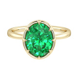 Elegant Colombian emerald engagement ring with oval emerald center stone in bezel setting and tapered yellow gold band by Pel & Co