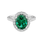 Classic green emerald oval ring with pavé diamonds, luxury emerald engagement ring design