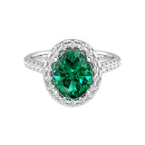 Classic green emerald oval ring with pavé diamonds, luxury emerald engagement ring design