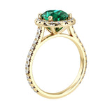 Profile view of emerald diamond pavé ring, elegant oval green gemstone ring