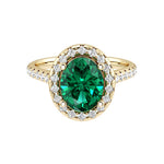 Oval emerald engagement ring in 14k gold with french pavé diamond band, lab grown green gemstone ring