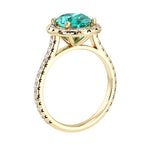 View of paraiba pavé diamond ring, modern oval neon gemstone ring design
