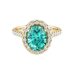 Oval paraiba tourmaline ring in 14k gold with french pavé diamond band, neon blue green gemstone ring