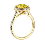 Profile view of yellow sapphire pavé ring, elegant oval engagement ring design