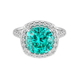Sparkling neon blue green Paraiba tourmaline French Pave Diamond Halo crafted in 14K White Gold halo ring Pel and Co custom fine jewelry
