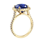 Sparkling blue Sapphire French Pave Diamond Halo crafted in 14K Yellow Gold halo ring Pel and Co timeless design