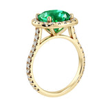 Sparkling colombian emerald French Pave Diamond Halo crafted in 14K Yellow Gold halo ring Pel and Co timeless design