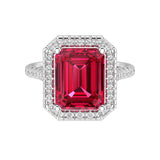 Vivid Red Ruby Emerald Cut center with French Pave Diamond Halo crafted in 14K White Gold Pel and Co custom fine jewelry romance design
