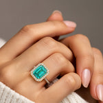 Emerald Cut Paraiba Tourmaline French Pave Diamond Halo fine jewelry ring in 14K Yellow Gold Pel and Co electric blue heirloom design 